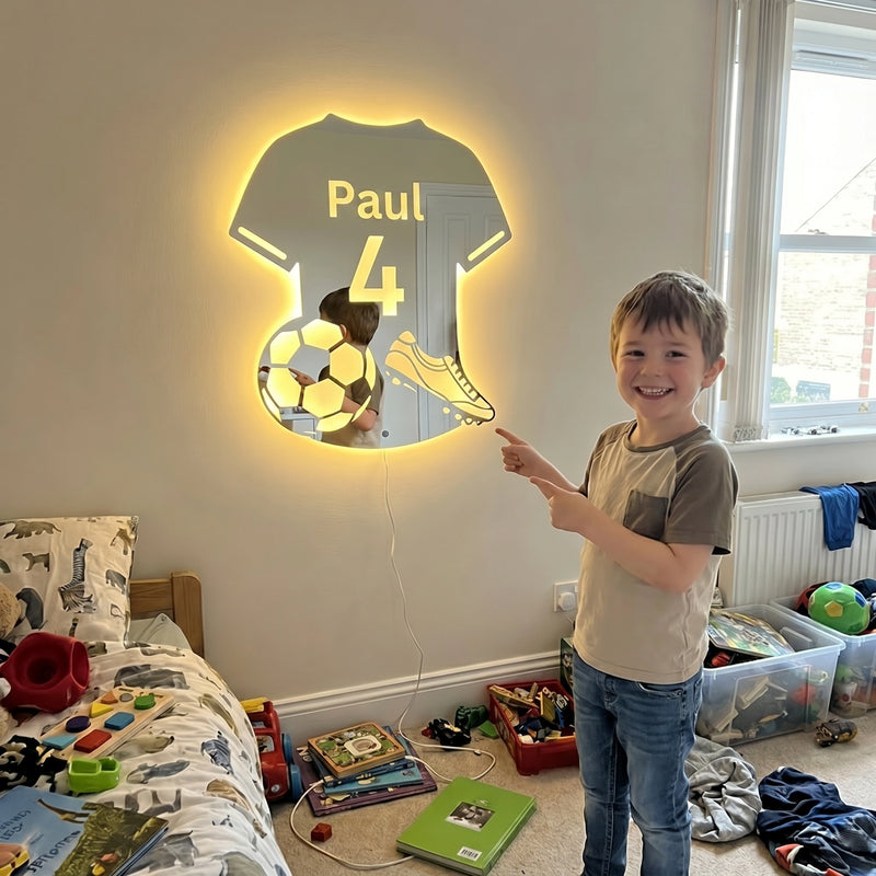 Bambino con il suo specchio LumiFoot